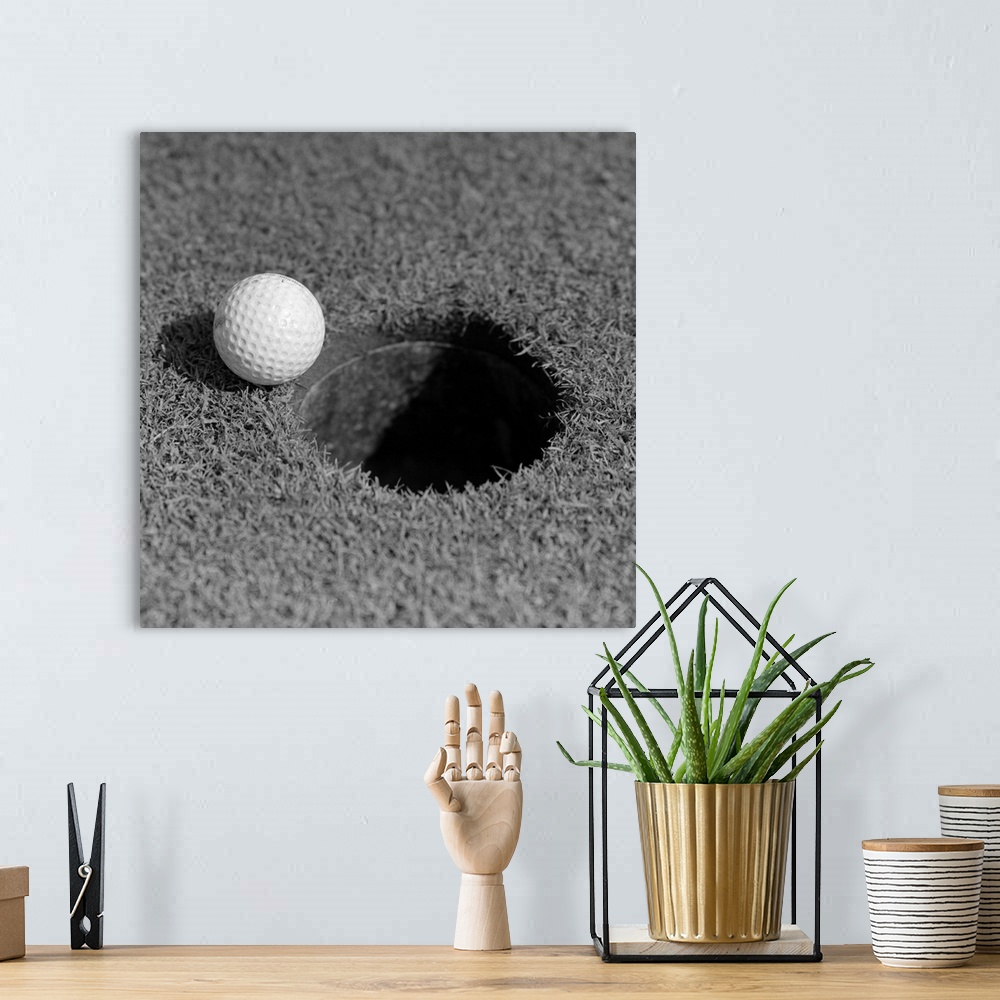 A bohemian room featuring 1950's Close-Up Of Golf Ball On Green