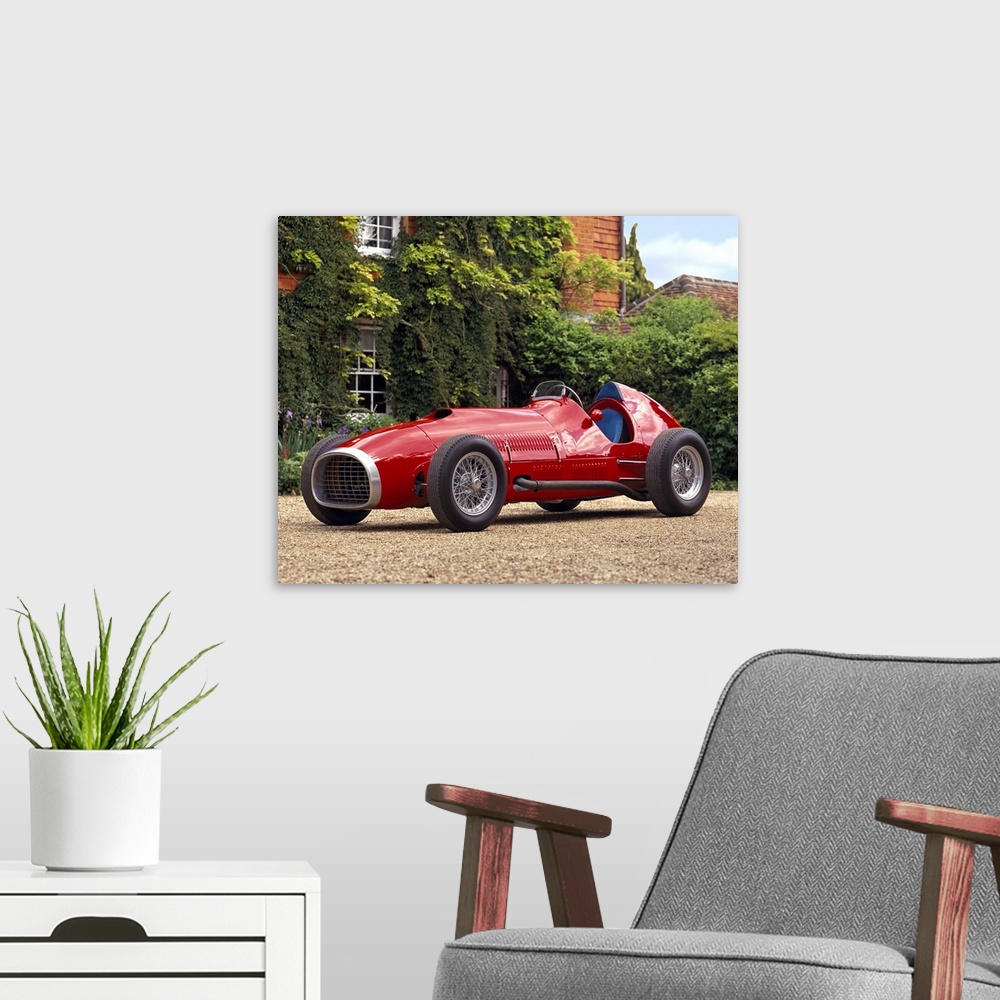 A modern room featuring 1952 Ferrari 375 'Indianapolis' Formula 1/AAA Championship Trail Racing Single-Seater. Ex-Johnny ...