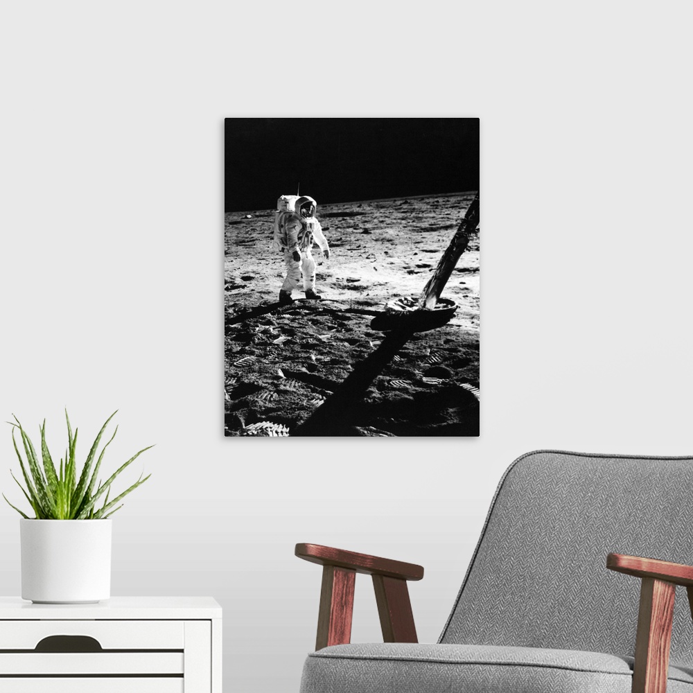 A modern room featuring 1960s Astronaut Buzz Aldrin In Space Suit Walking On The Moon Near The Apollo 11 Lunar Module Jul...