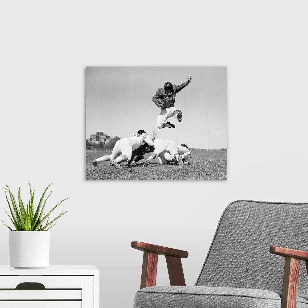A modern room featuring 1960's Football Player Jumping Over Blocked Players