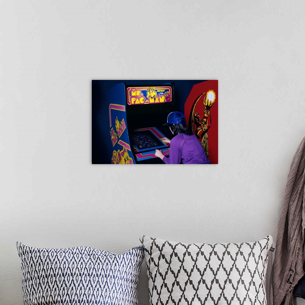 A bohemian room featuring 1980's  Teen Girl Playing Ms. Pac Man Video Game In Arcade