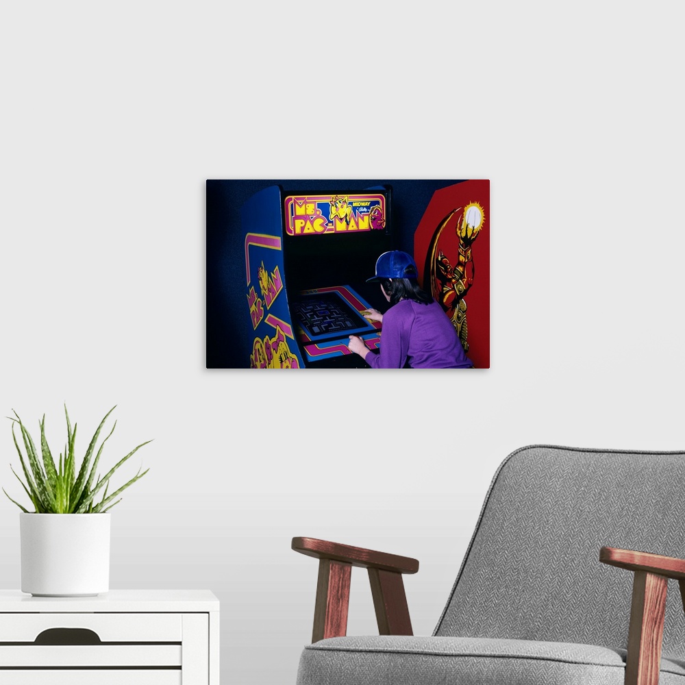 A modern room featuring 1980's  Teen Girl Playing Ms. Pac Man Video Game In Arcade