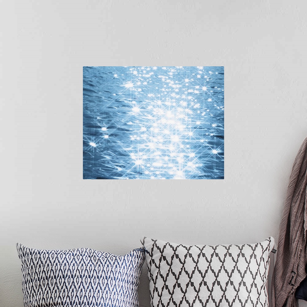 A bohemian room featuring Abstract blue water background with sparks
