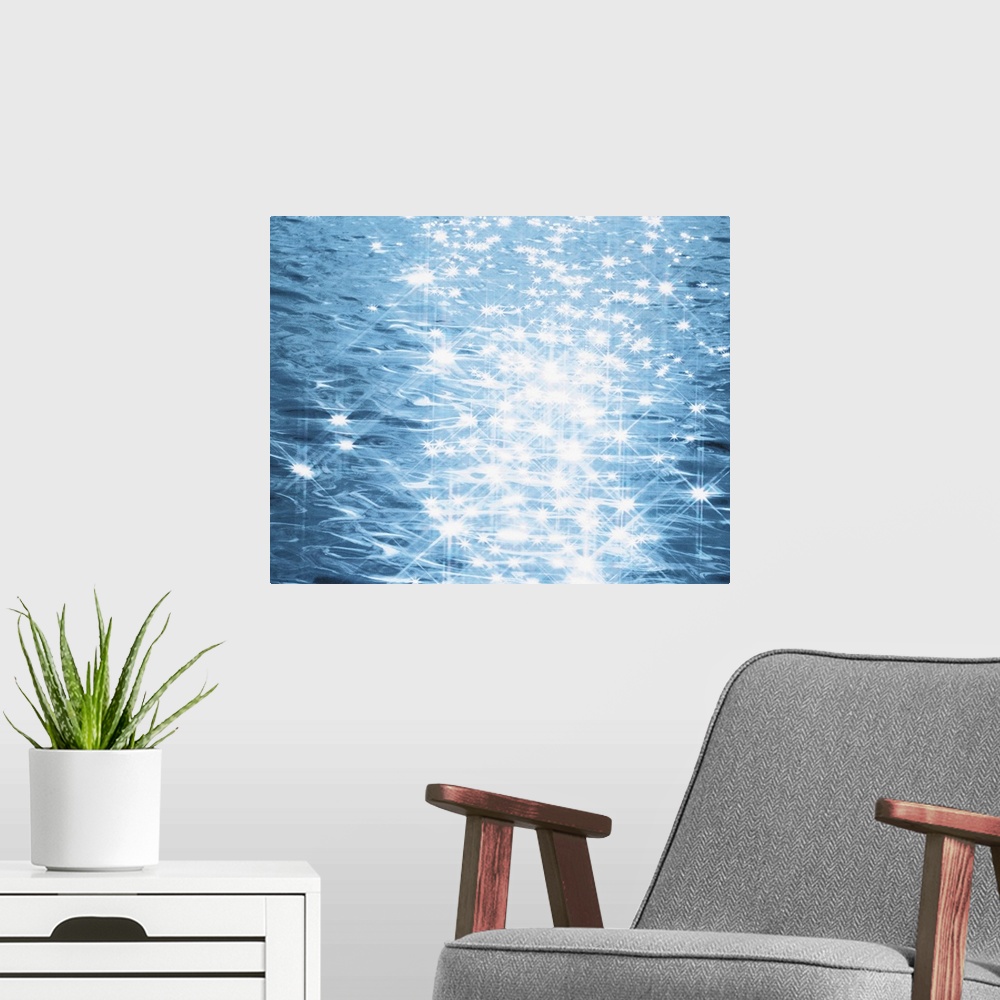 A modern room featuring Abstract blue water background with sparks