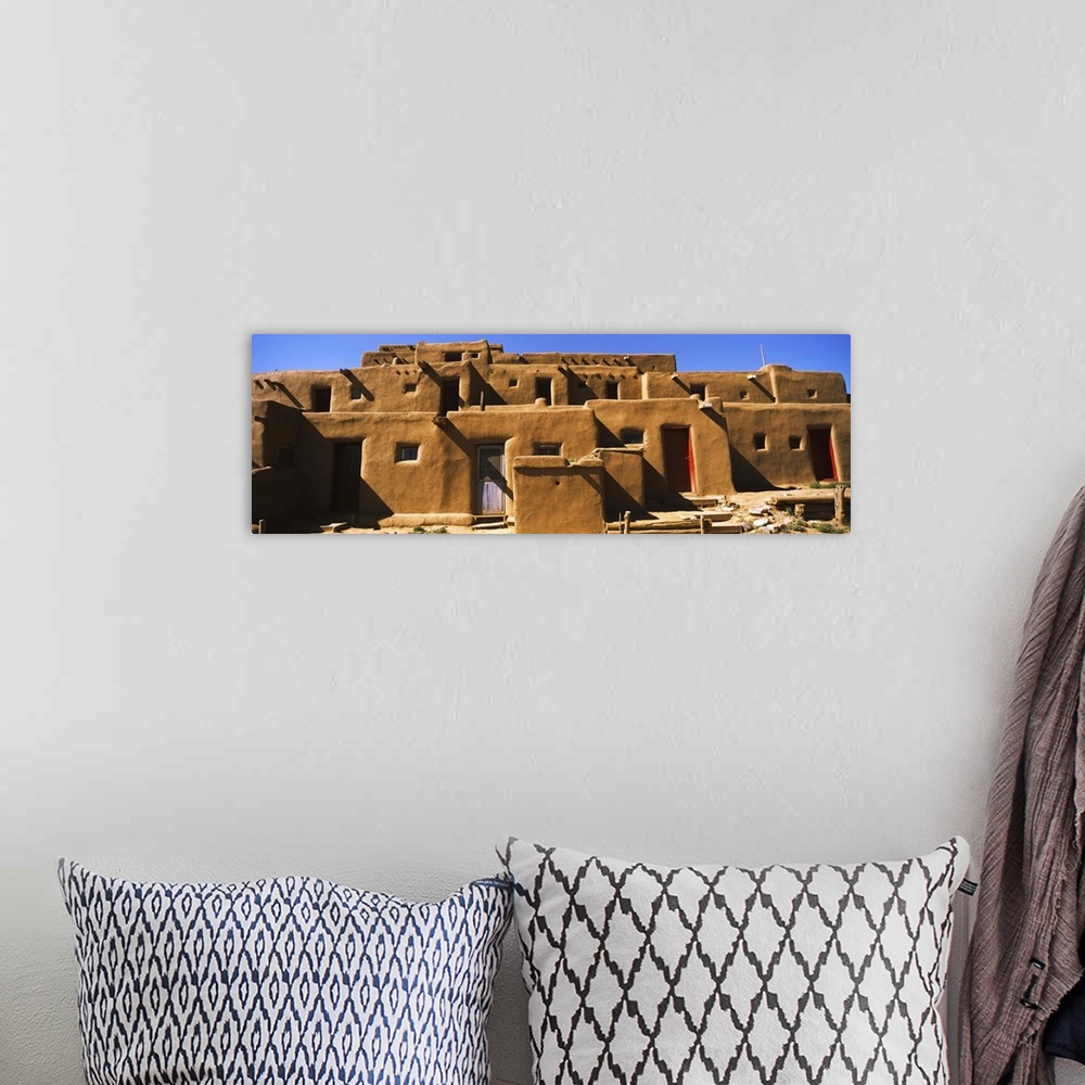 A bohemian room featuring Adobe houses in a village, Taos Pueblo, Taos, Taos County, New Mexico