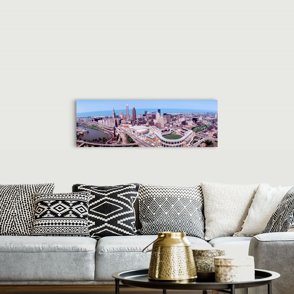 A bohemian room featuring Wide angle aerial photograph of downtown, Lake Erie, and stadium.