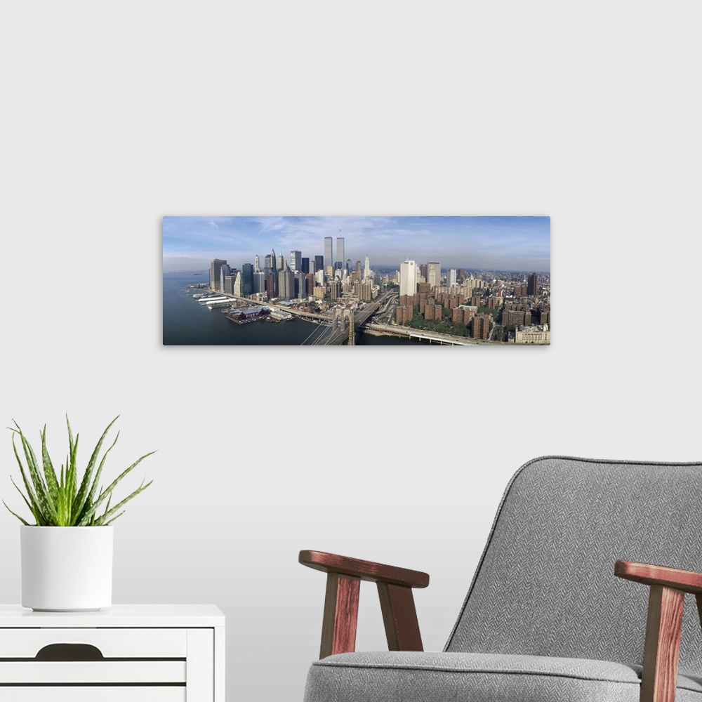A modern room featuring Aerial Manhattan  Brooklyn Bridge New York City NY