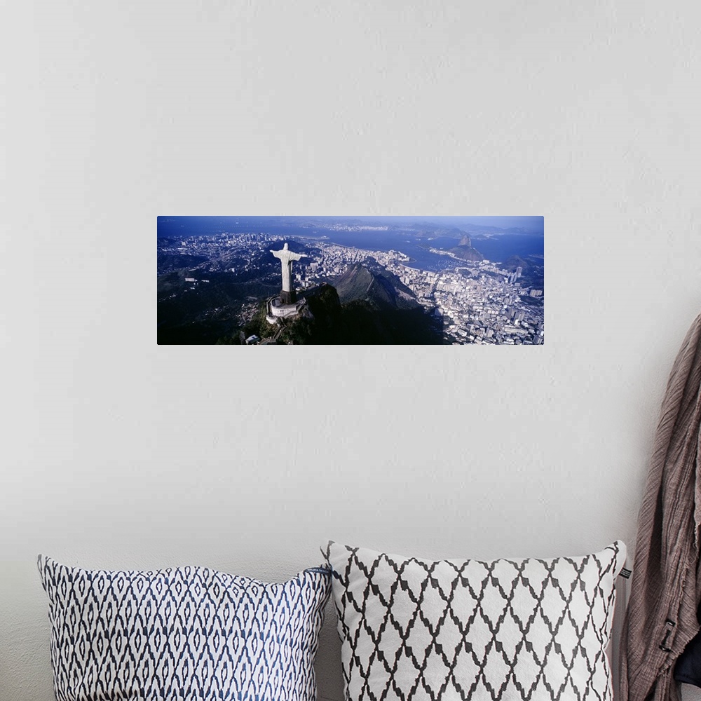 A bohemian room featuring Panoramic photograph taken from behind the famous Christ the Redeemer statue that is overlooking ...