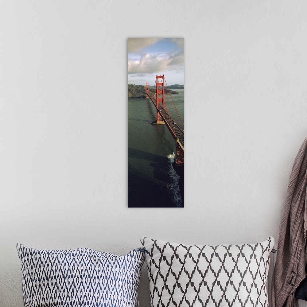 A bohemian room featuring This tall vertical panoramic picture is taken from above the Golden Gate Bridge looking down the ...