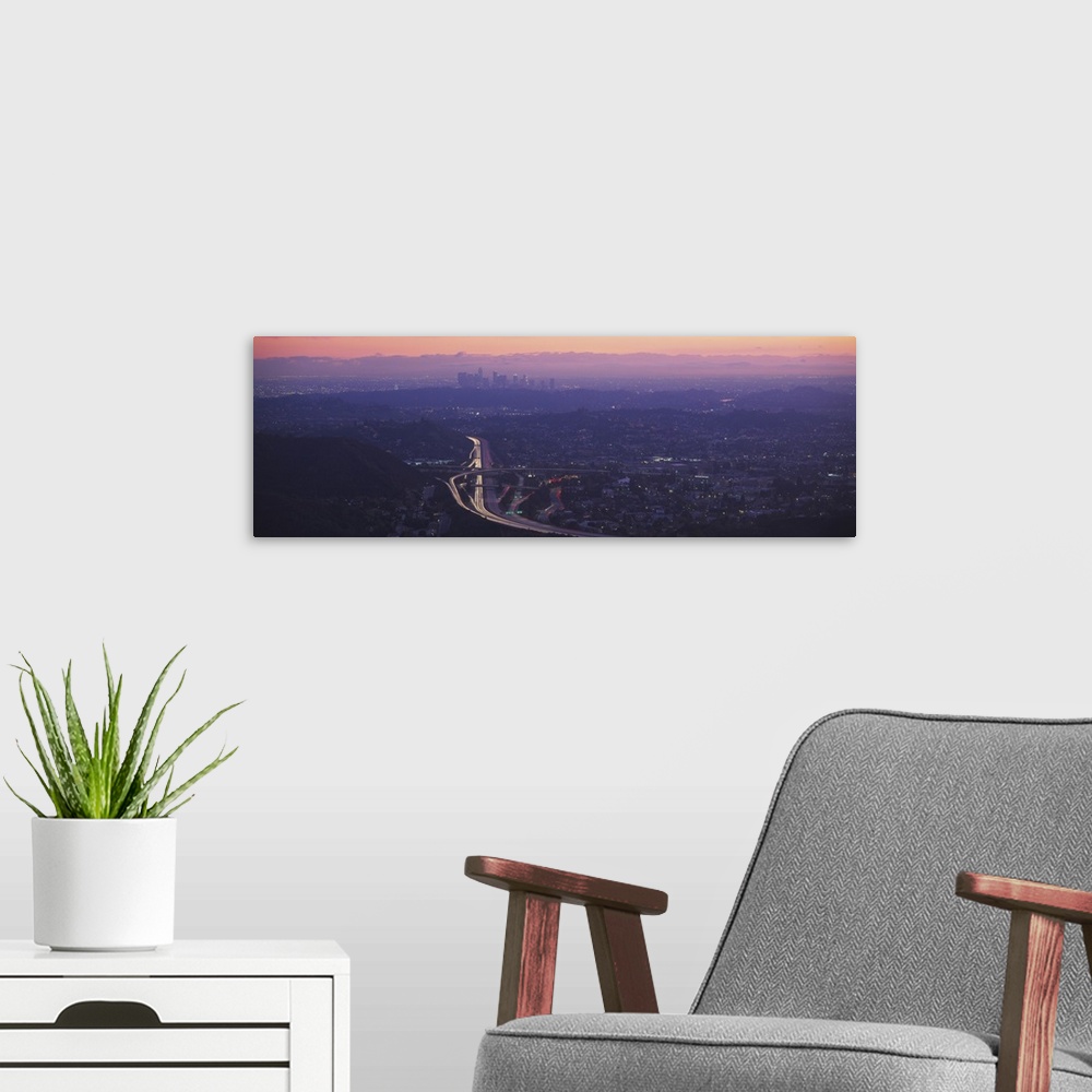 A modern room featuring Aerial view of a city at dusk looking towards Los Angeles, Glendale, California