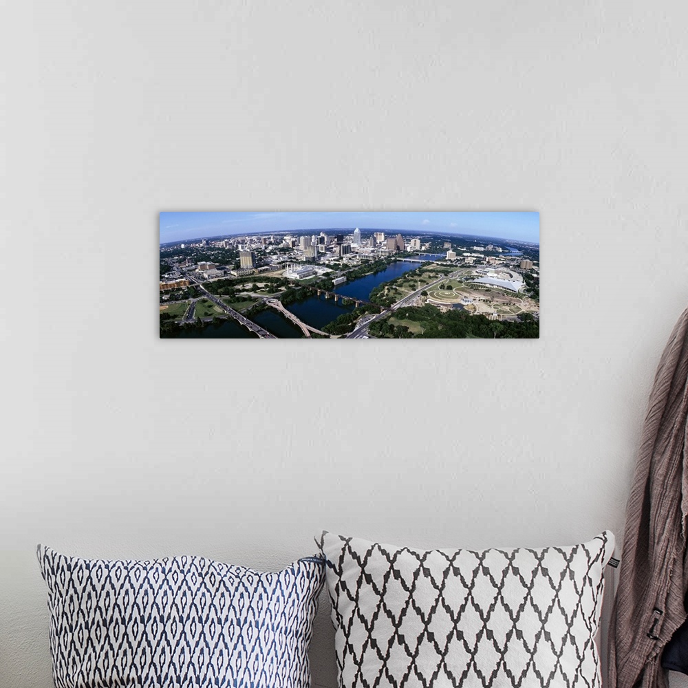 A bohemian room featuring Wide photo from above of the city of Austin, Texas and the Colorado River.
