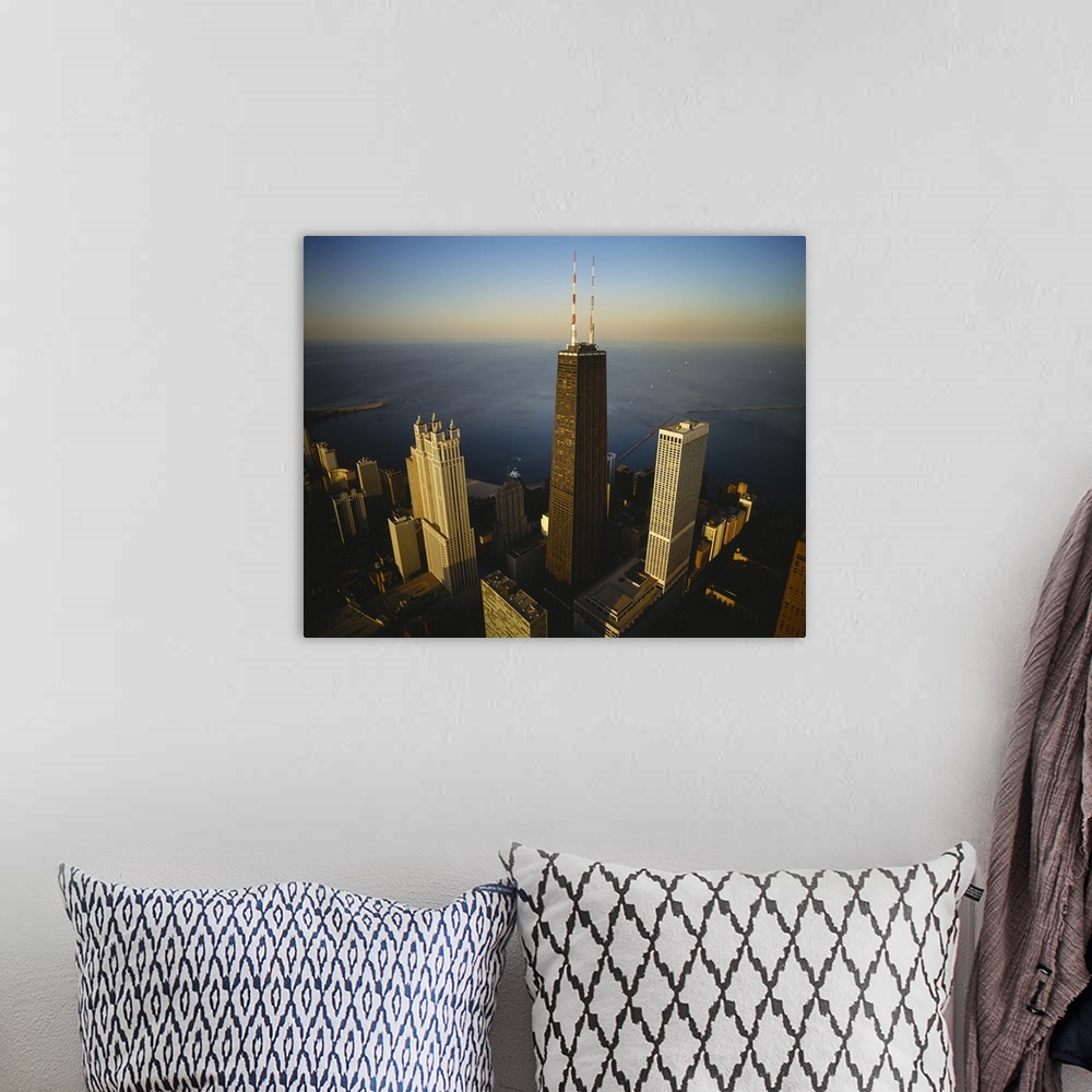 A bohemian room featuring Large photo on canvas of an upclose view of buildings in downtown Chicago along the waterfront.