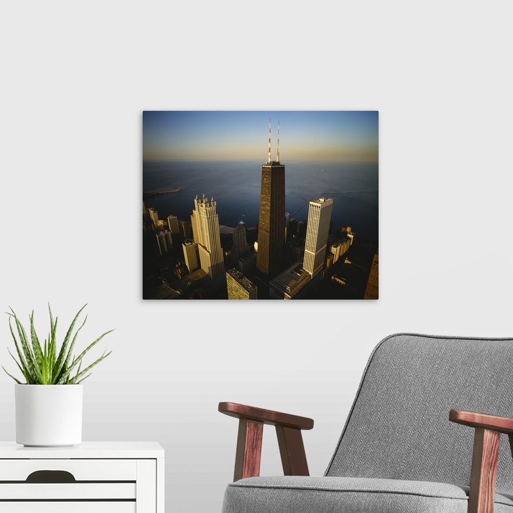 A modern room featuring Large photo on canvas of an upclose view of buildings in downtown Chicago along the waterfront.