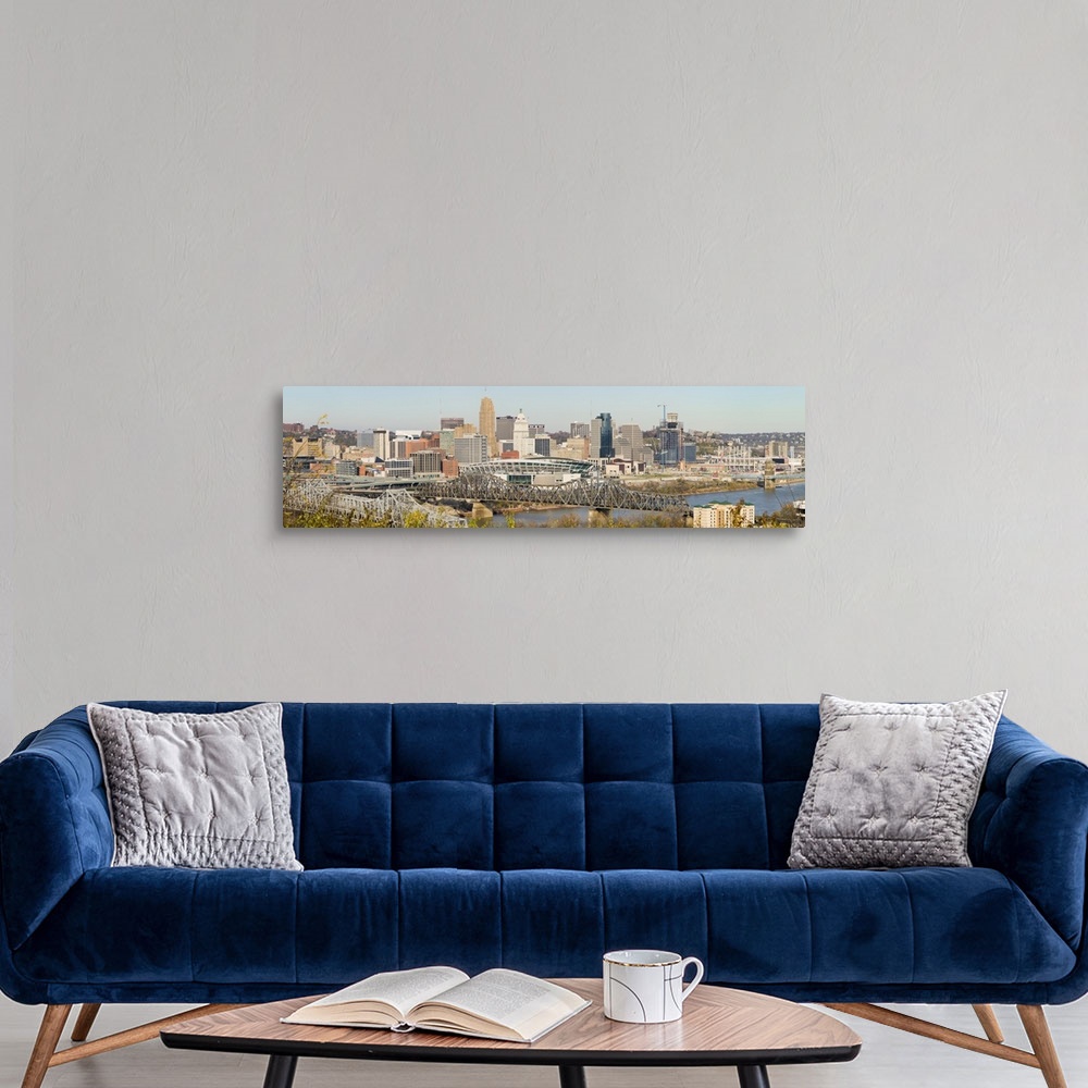 A modern room featuring Panoramic photograph of skyline featuring iconic buildings such as the Carew Tower, PNC Tower, Ci...