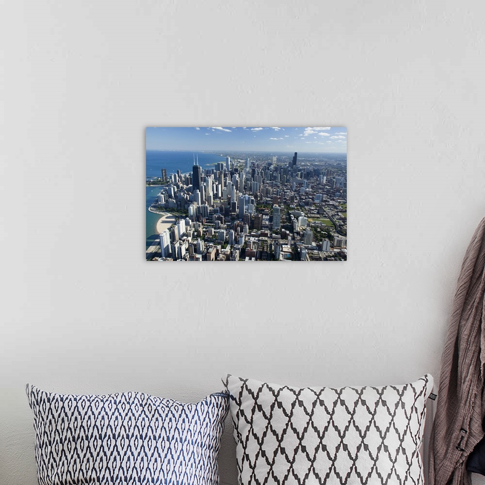 A bohemian room featuring Oversized, landscape, aerial photograph of Chicago, Illinois, along the Lake Michigan shoreline.
