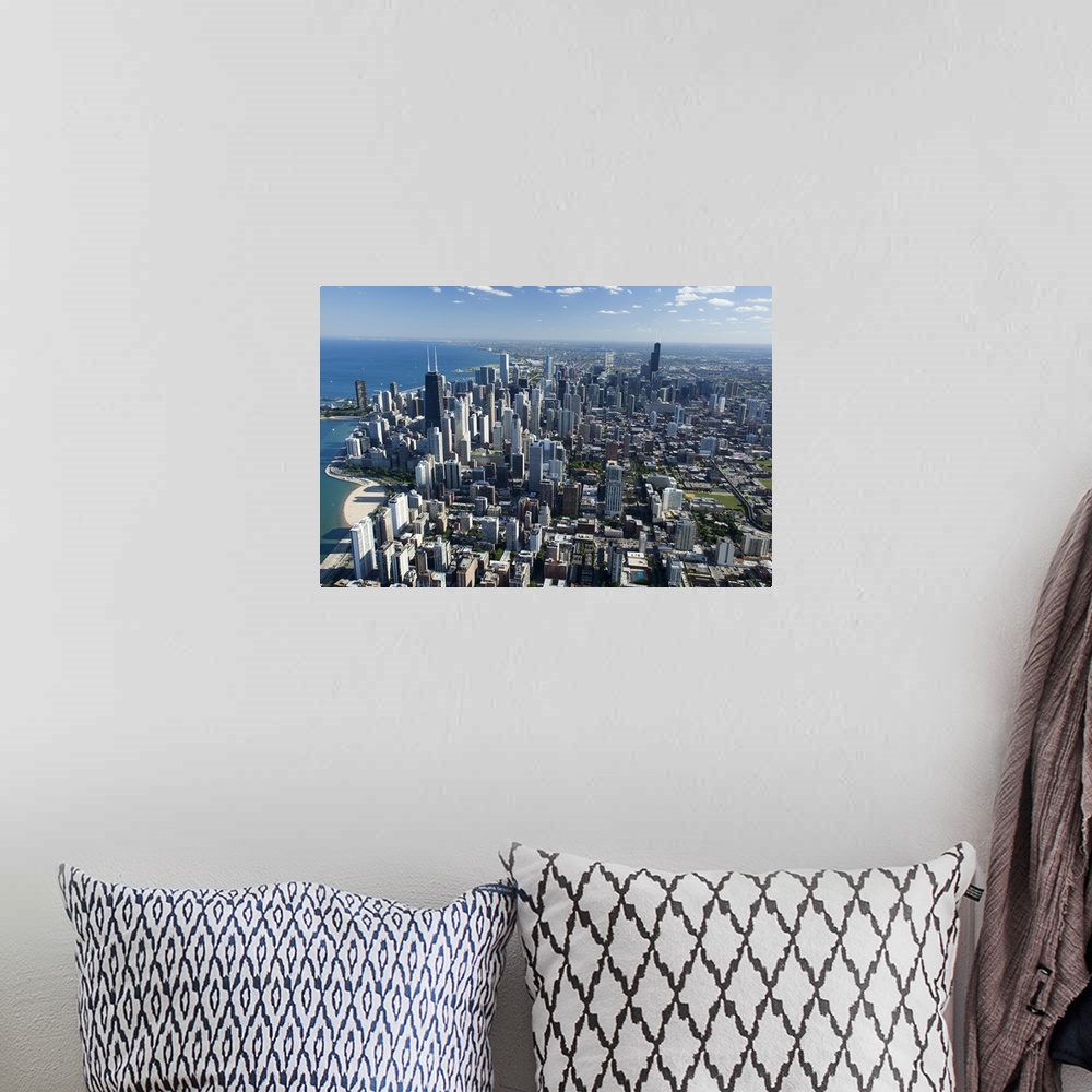 A bohemian room featuring Oversized, landscape, aerial photograph of Chicago, Illinois, along the Lake Michigan shoreline.