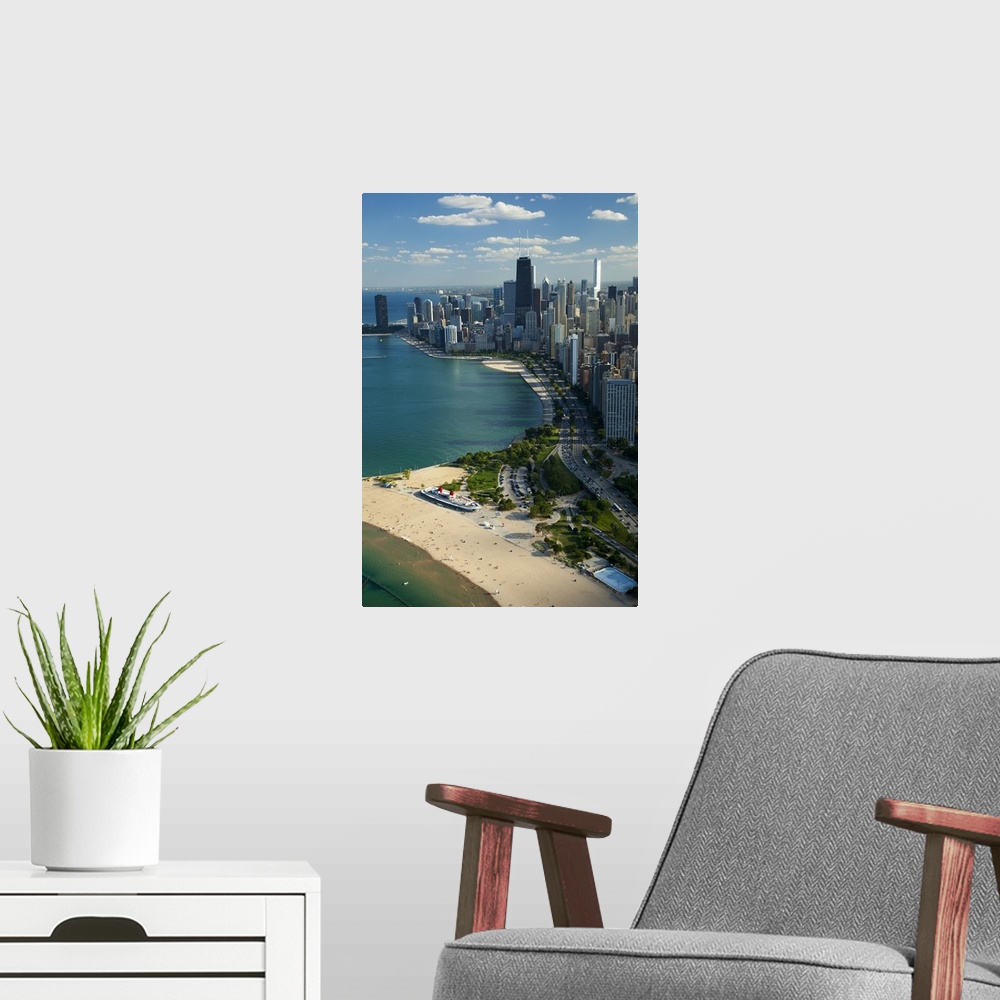 A modern room featuring Big vertical aerial view of the city of Chicago in Cook County, Illinois (IL). People relaxing an...