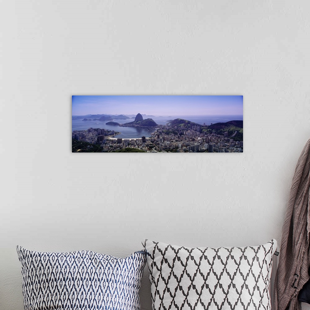 A bohemian room featuring Panoramic photo from above of the city of Rio De Janeiro in Brazil.