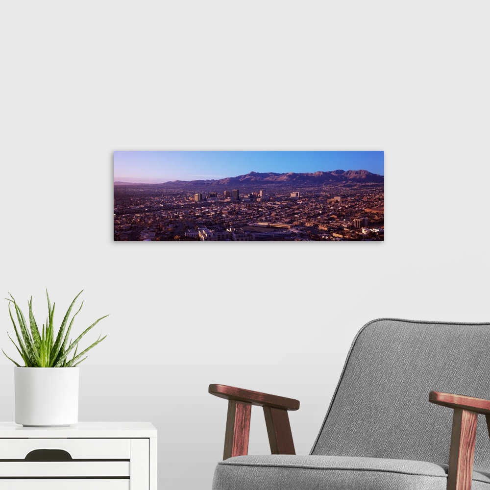 A modern room featuring Aerial view of a cityscape, El Paso, Texas-Mexico Border