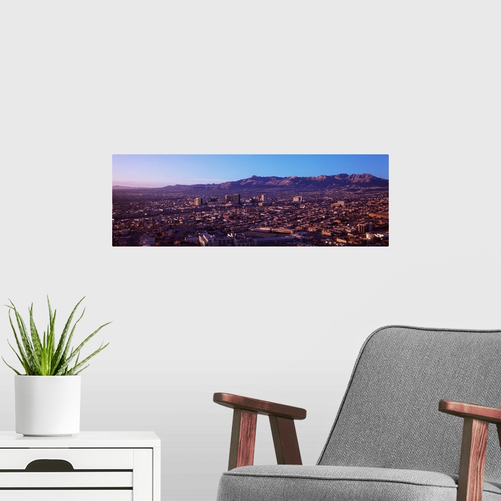 A modern room featuring Aerial view of a cityscape, El Paso, Texas-Mexico Border