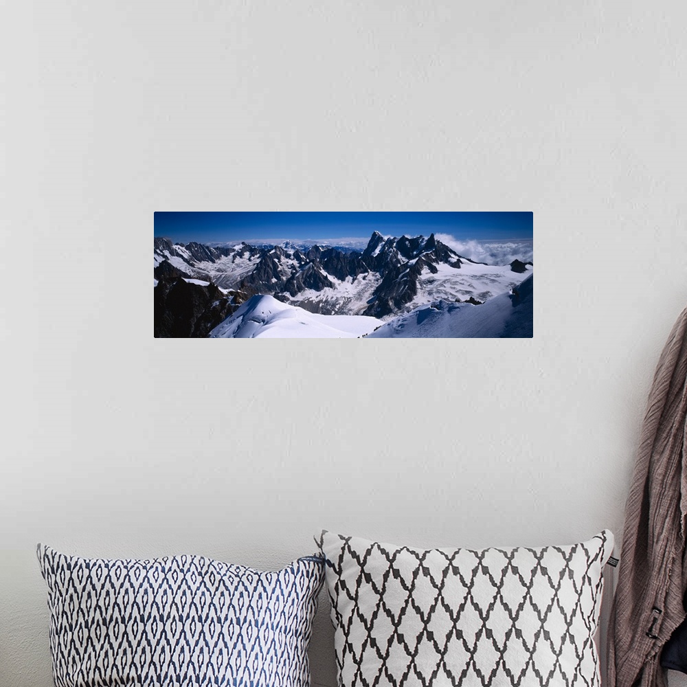 A bohemian room featuring Aerial view of a snow covered mountain range, Mt Blanc, France