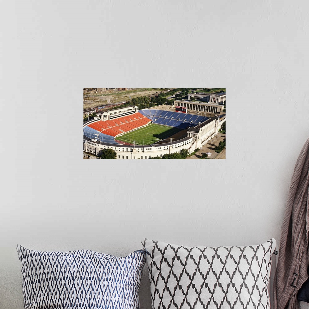 A bohemian room featuring Photo on canvas of the oldest NFL stadium which home to the Chicago Bears seen from above.