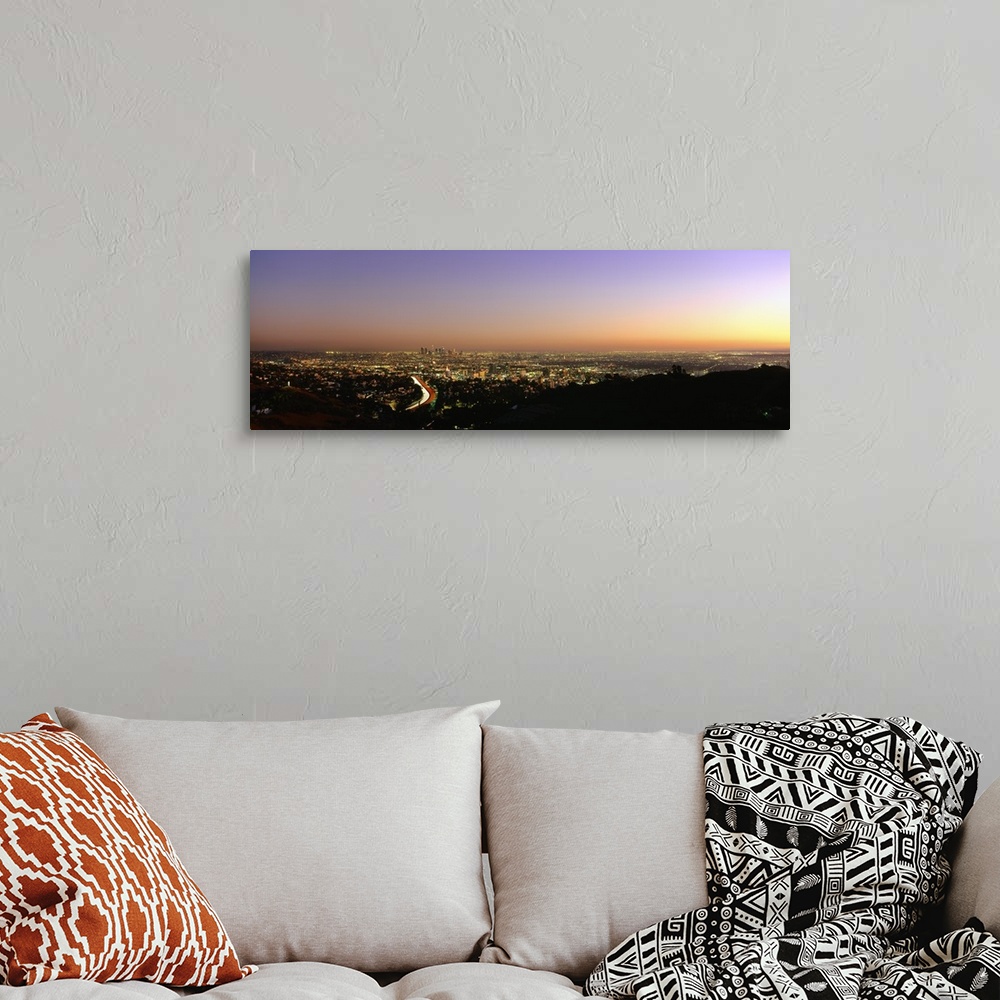 A bohemian room featuring Aerial view of buildings in a city at dusk from Hollywood Hills, Hollywood, City of Los Angeles, ...