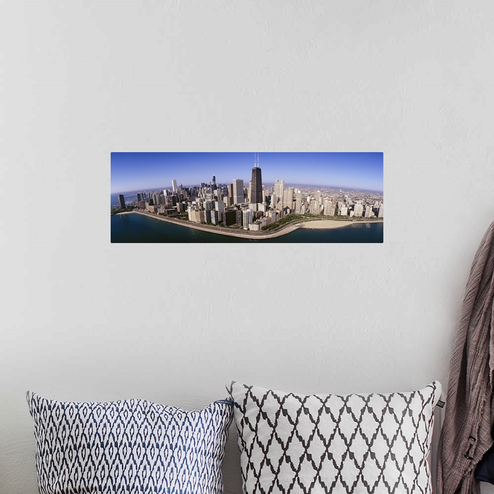 A bohemian room featuring This wide angle photograph was taken from above the Chicago skyline over Lake Michigan that lines...