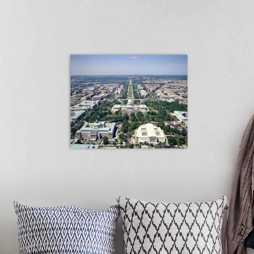 A bohemian room featuring High-angle view of the Capital of the United States.  Iconic buildings, monuments, and rivers are...
