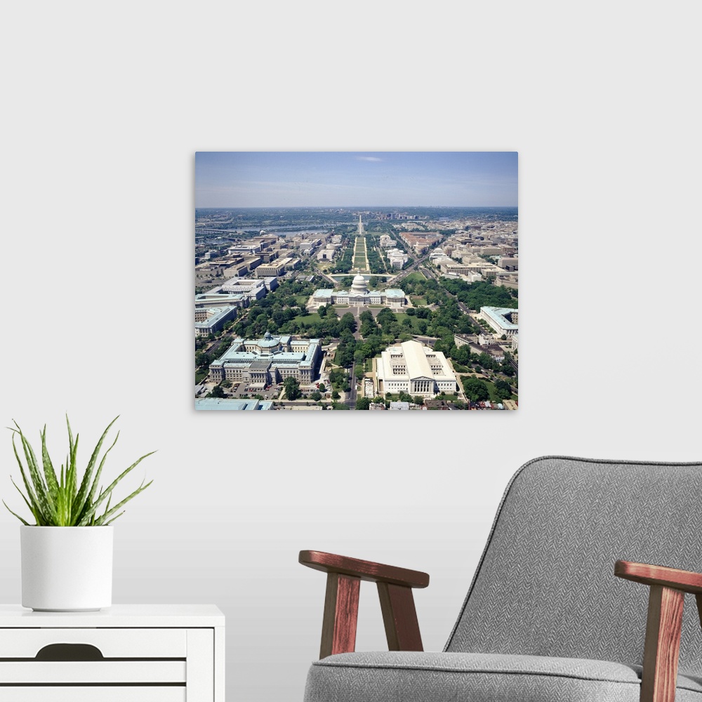 A modern room featuring High-angle view of the Capital of the United States.  Iconic buildings, monuments, and rivers are...