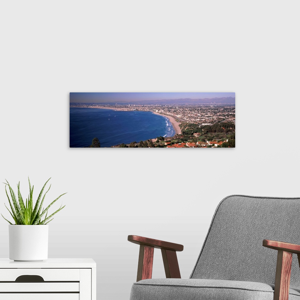 A modern room featuring Aerial view of a city at coast, Santa Monica Beach, Beverly Hills, Los Angeles County, California...