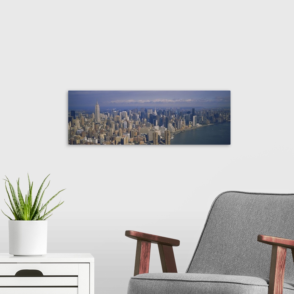 A modern room featuring Aerial view of skyscrapers on the waterfront, Manhattan, New York City, New York State