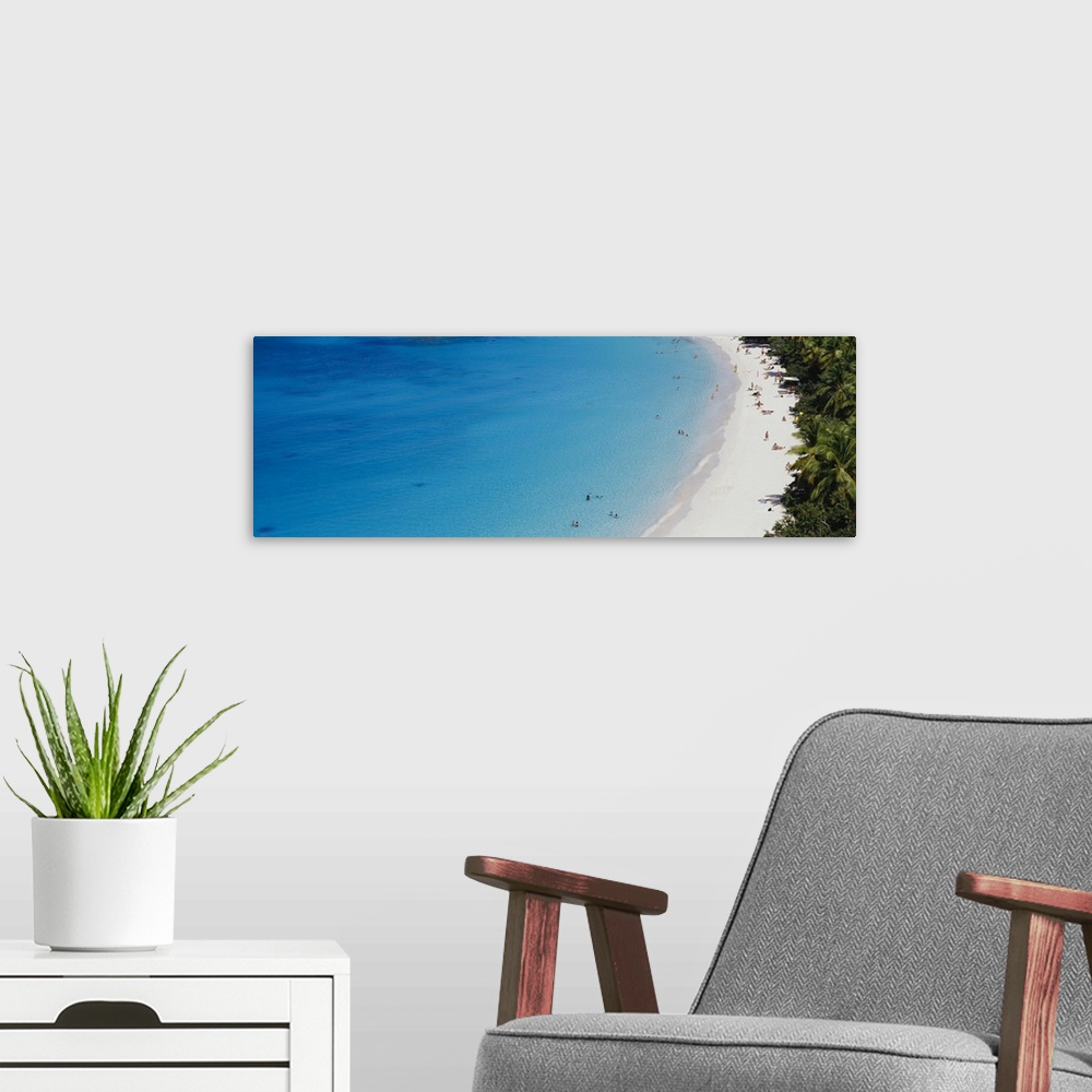 A modern room featuring Aerial view of tourists on the beach, Trunk Bay, St. John, US Virgin Islands, West Indies