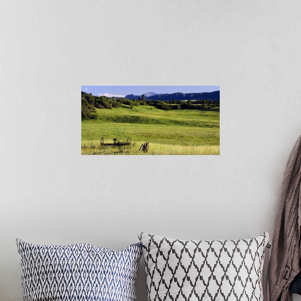 A bohemian room featuring Agricultural equipment in a field, Pikes Peak, Larkspur, Colorado