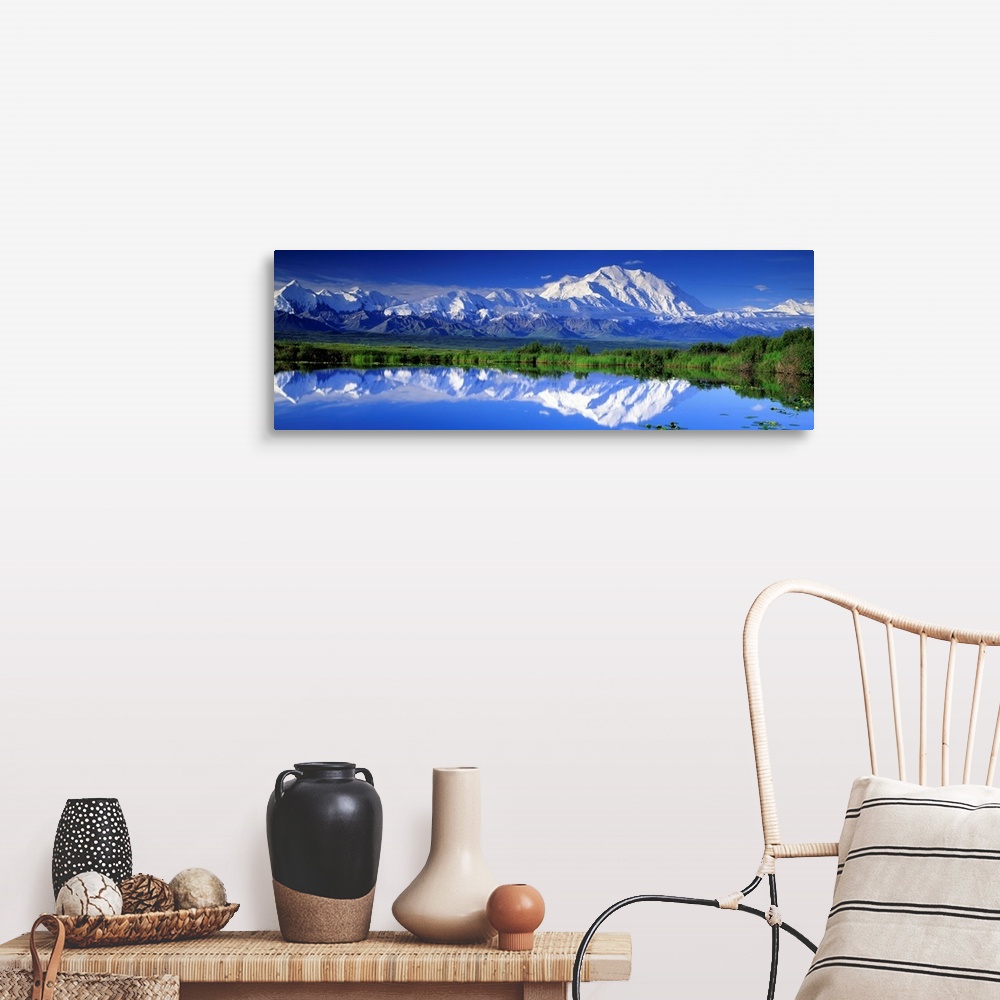 A farmhouse room featuring Panoramic view of snowcapped mountains and Mt. McKinley reflecting in still waters.