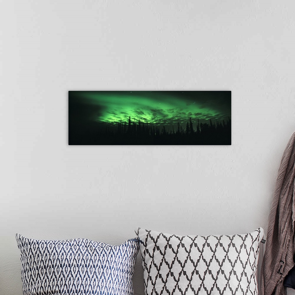 A bohemian room featuring Giant, panoramic photograph of the northern lights in Fairbanks, Alaska, over the silhouettes of ...