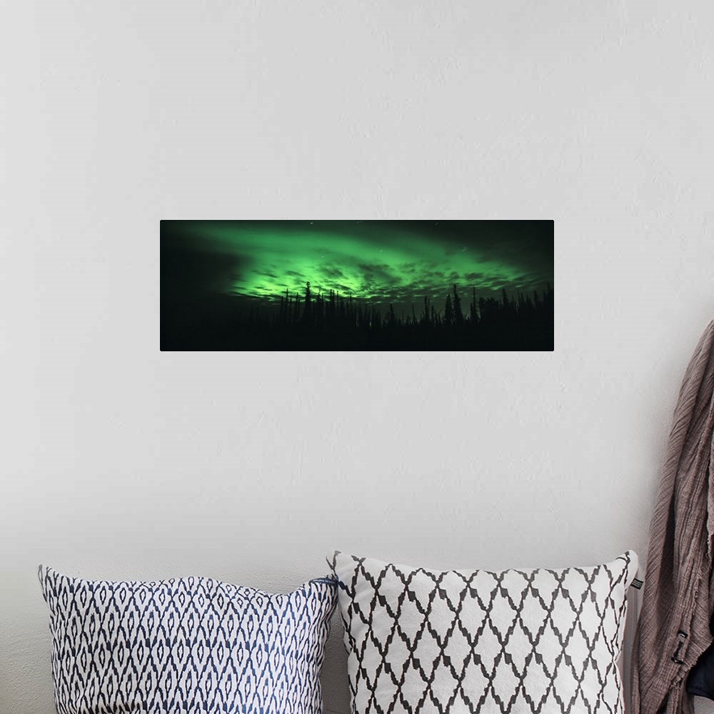 A bohemian room featuring Giant, panoramic photograph of the northern lights in Fairbanks, Alaska, over the silhouettes of ...