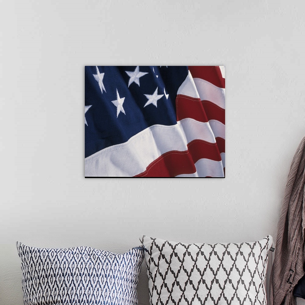 A bohemian room featuring Close-up photograph of a rippling flag of the United States of America.