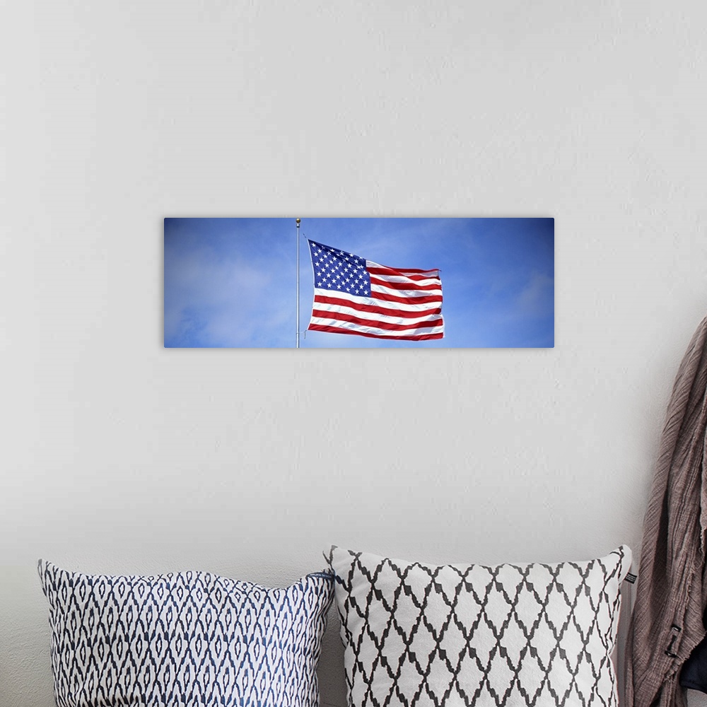 A bohemian room featuring American Flag Flying