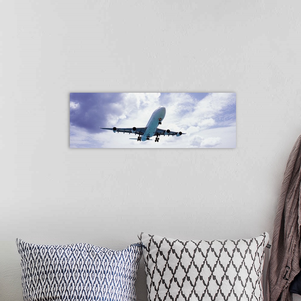 A bohemian room featuring An airplane in flight, Maho Beach, Sint Maarten, Netherlands Antilles