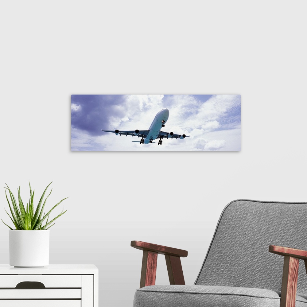 A modern room featuring An airplane in flight, Maho Beach, Sint Maarten, Netherlands Antilles