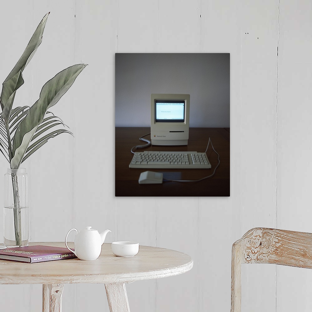 A farmhouse room featuring Apple Macintosh Classic desktop PC