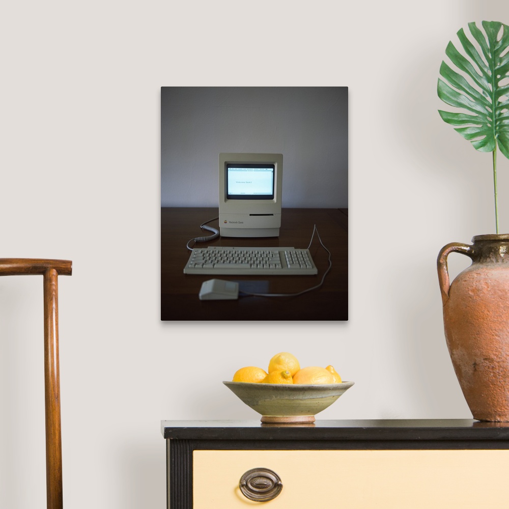 A traditional room featuring Apple Macintosh Classic desktop PC