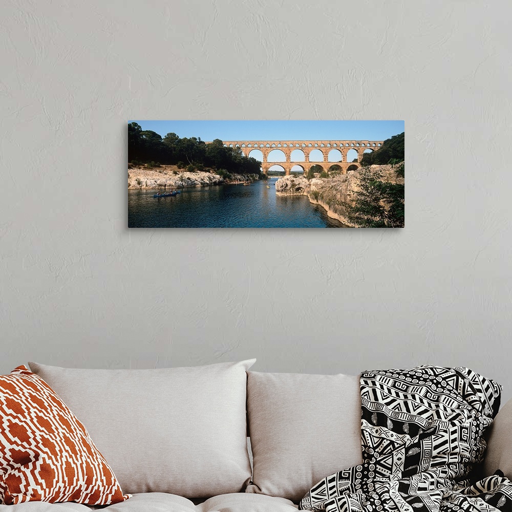 A bohemian room featuring Aqueduct across a river, Pont Du Gard, Nimes, Gard, Languedoc Rousillon, France