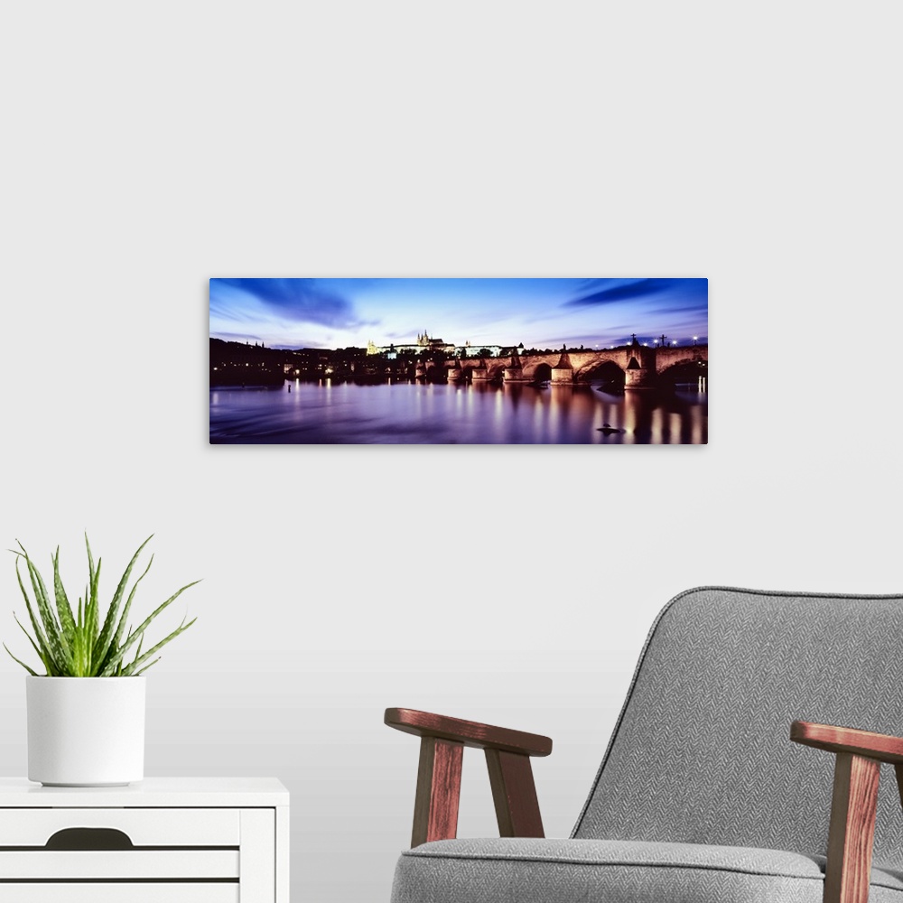 A modern room featuring Arch bridge across a river with a cathedral in the background, St. Vitus Cathedral, Hradcany Cast...