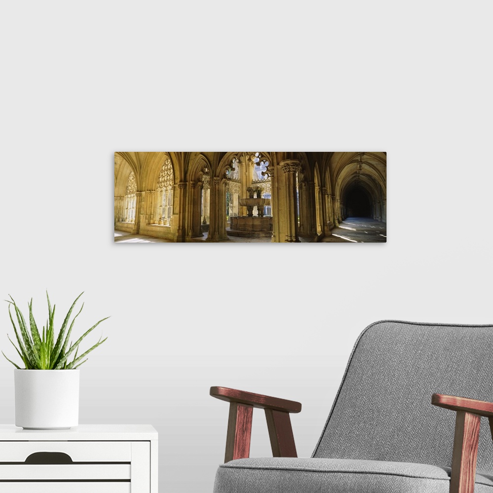 A modern room featuring Arched hallway in a cathedral, Batalha Abbey, Portugal