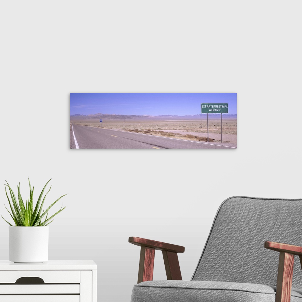 A modern room featuring Area 51 Highway road sign, Nevada