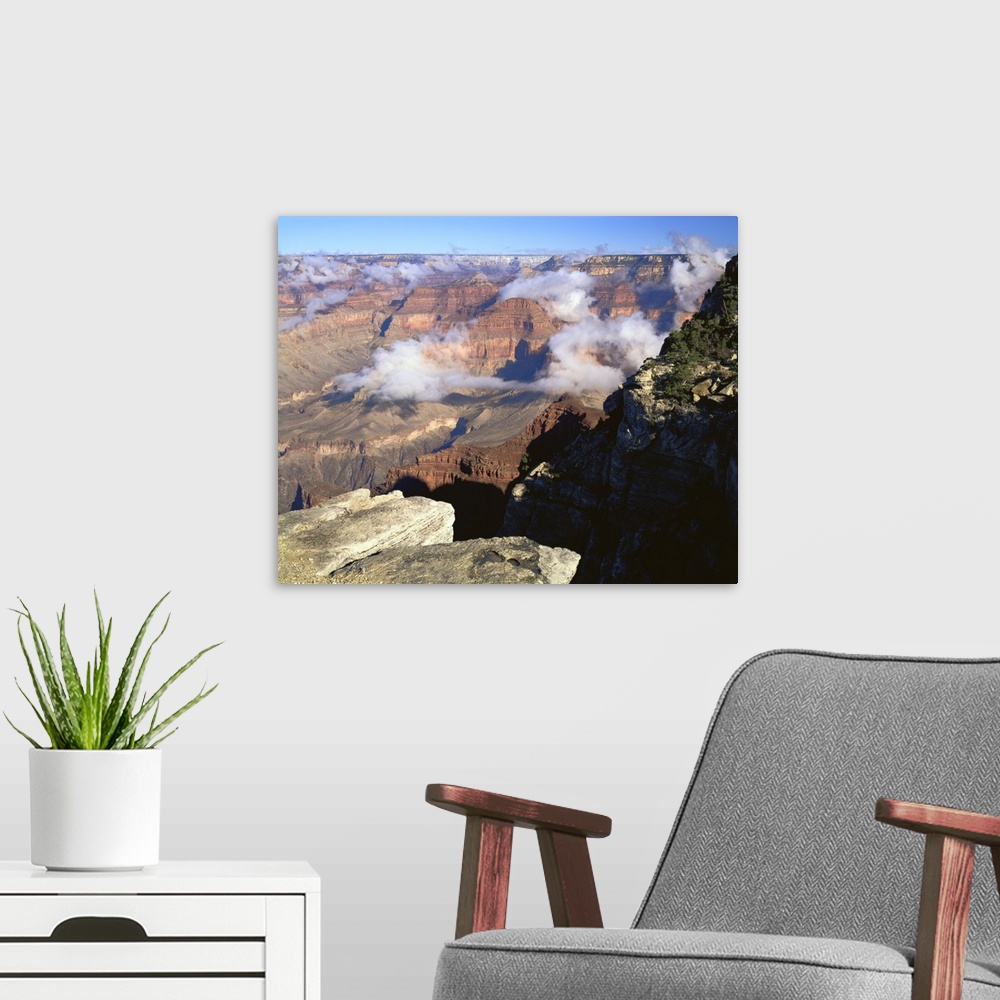 A modern room featuring Arizona, Grand Canyon National Park, Clouds over the terrain