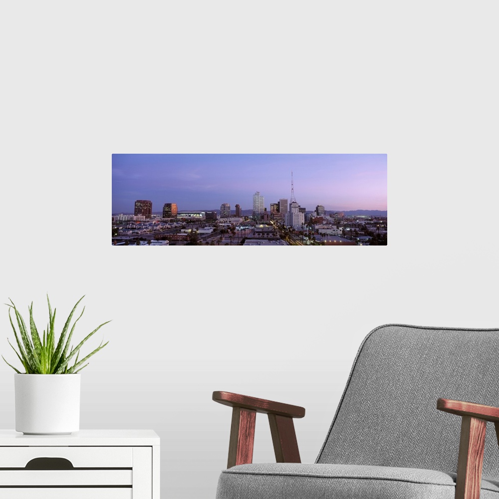 A modern room featuring Downtown Phoenix skyline panorama.