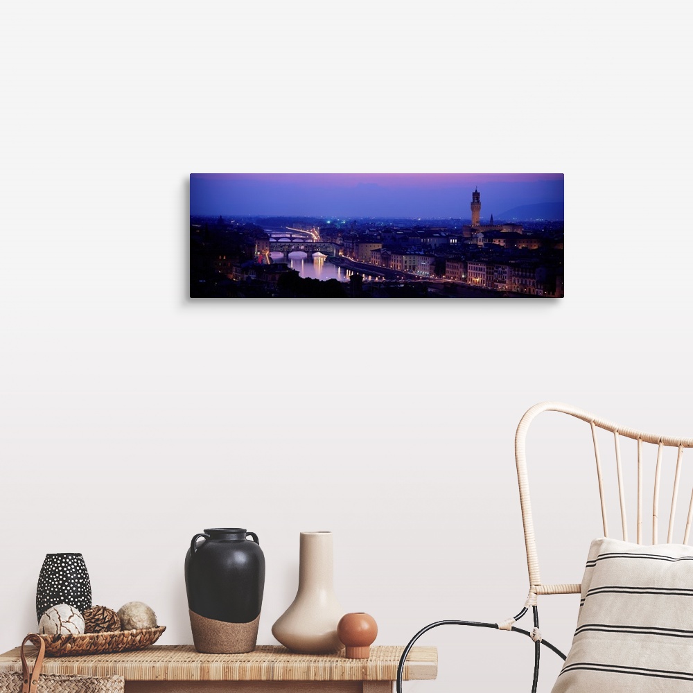 A farmhouse room featuring Panoramic photograph of skyline at night with buildings lit up.